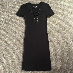 Long black dress, with silver holes.